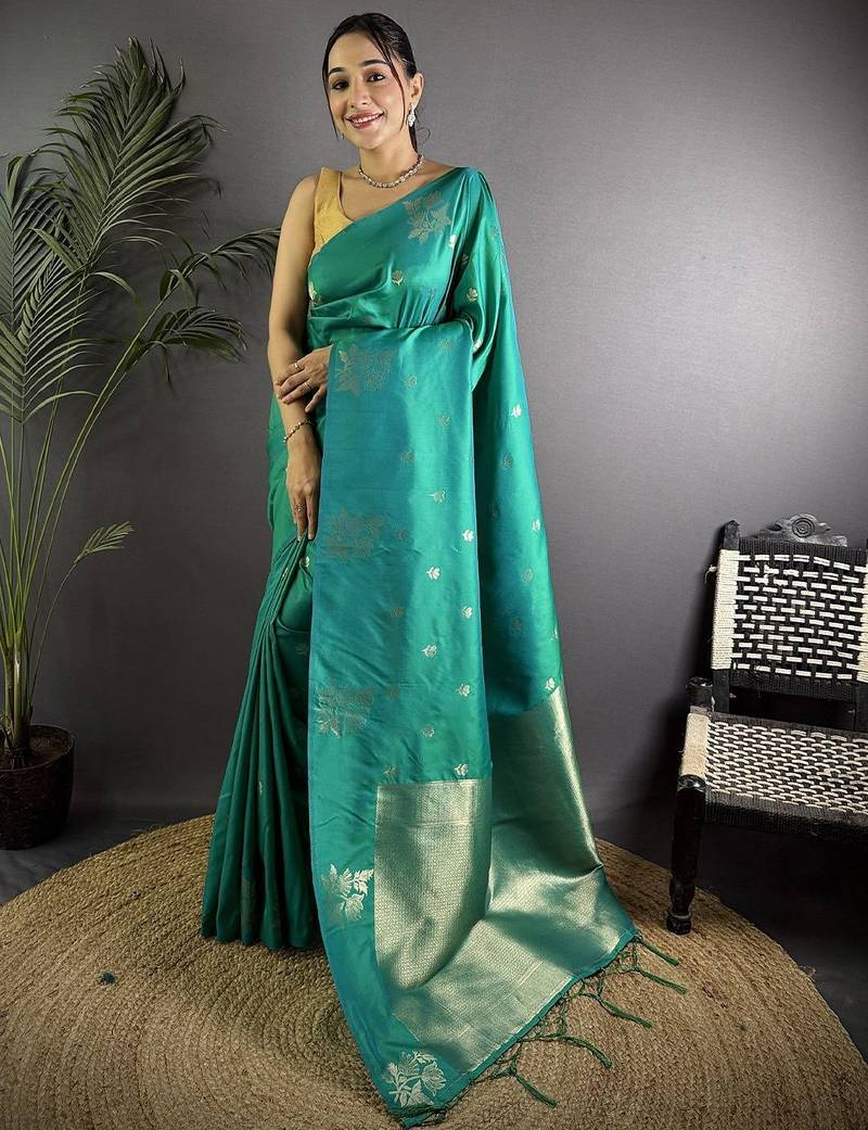 Teal floral woven design zari saree