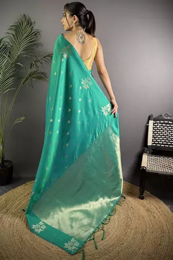 Teal floral woven design zari saree