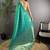 Teal floral woven design zari saree