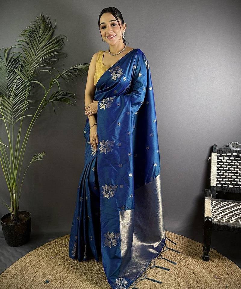 Turquoise woven design saree with flower weaving and matching blouse piece