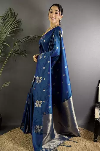 Turquoise woven design saree with flower weaving and matching blouse piece