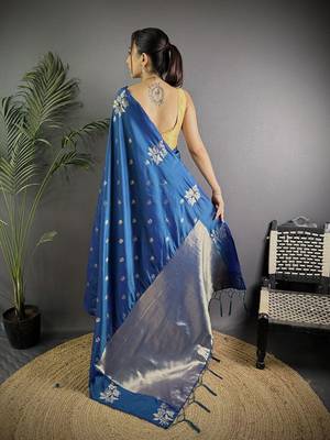 Turquoise woven design saree with flower weaving and matching blouse piece 3