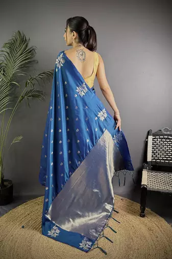 Turquoise woven design saree with flower weaving and matching blouse piece