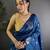 Turquoise woven design saree with flower weaving and matching blouse piece