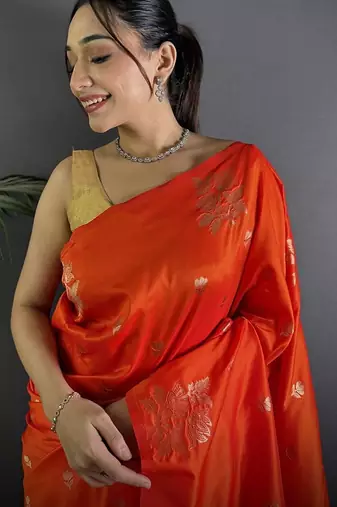 Orange woven design saree with blouse piece