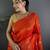 Orange woven design saree with blouse piece