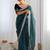 Teal sequinned net saree with blouse piece