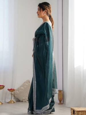 Teal sequinned net saree with blouse piece 2