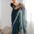 Teal sequinned net saree with blouse piece