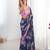 Blue floral printed scallop mirror work saree