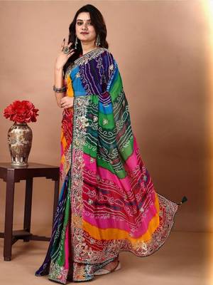 Green bandhani embroidered poly georgette bandhani saree 3