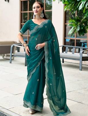 Teal woven design poly chiffon heavy work saree 1