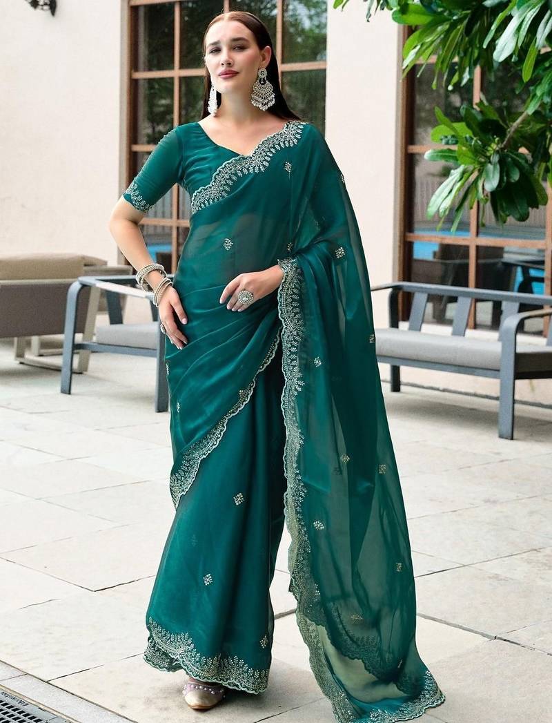 Teal woven design poly chiffon heavy work saree