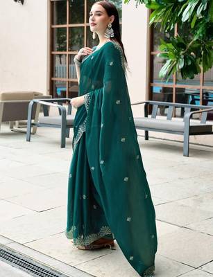 Teal woven design poly chiffon heavy work saree 2