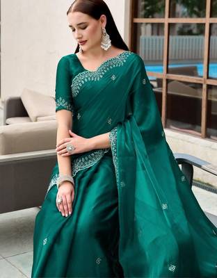 Teal woven design poly chiffon heavy work saree 4