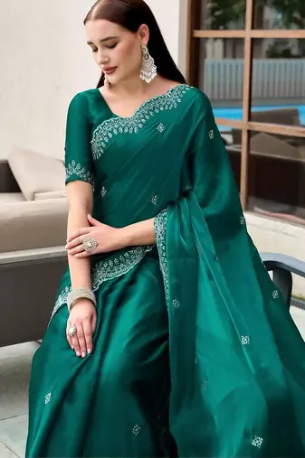 Teal woven design poly chiffon heavy work saree