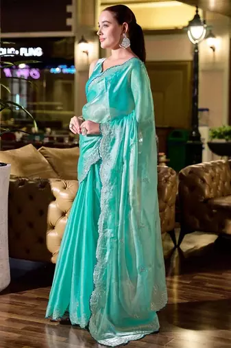 Turquoise woven design poly chiffon designer saree