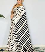 Off white polka dot satin block print saree