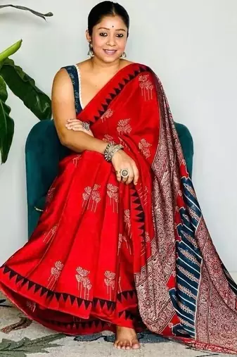 Rust floral satin block print saree