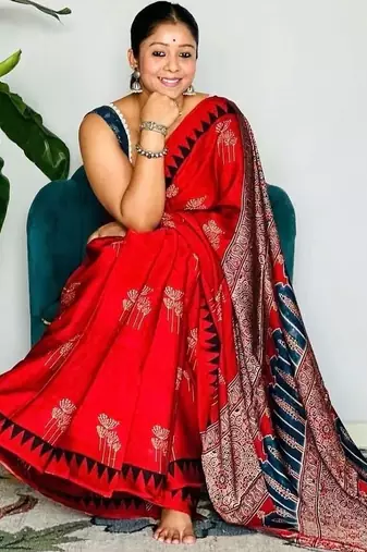 Rust floral satin block print saree