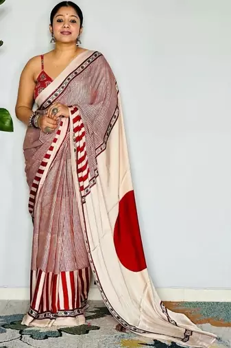 Cream striped satin block print saree