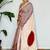 Cream striped satin block print saree