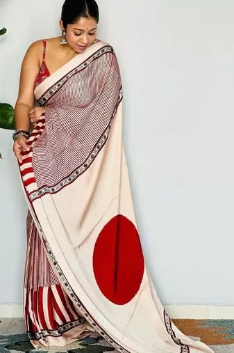 Cream striped satin block print saree