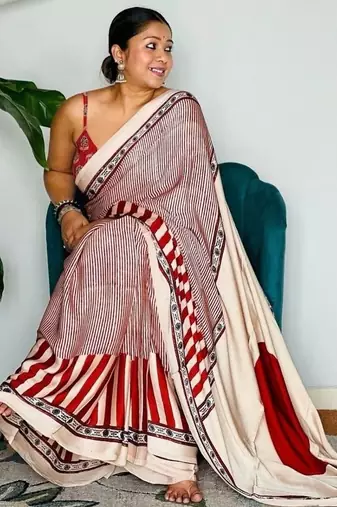 Cream striped satin block print saree