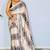 Cream ethnic motifs satin block print saree