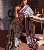 Cream ethnic motifs satin block print saree