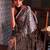 Cream ethnic motifs satin block print saree