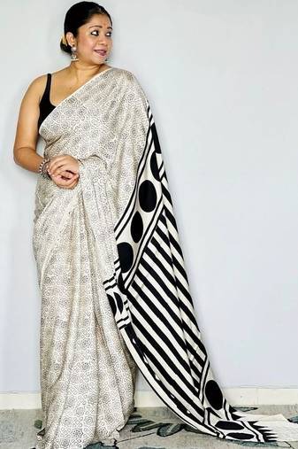 Off white ethnic motifs satin block print saree