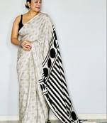Off white ethnic motifs satin block print saree
