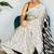 Off white ethnic motifs satin block print saree