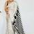 Off white ethnic motifs satin block print saree