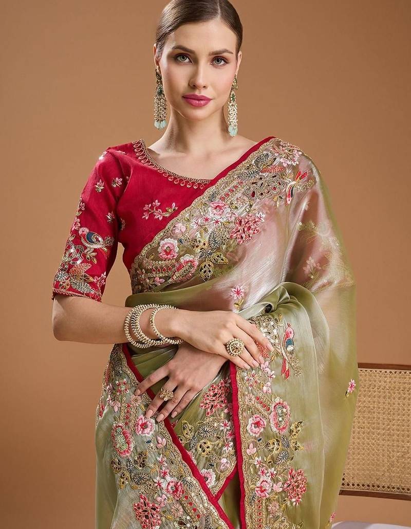 Green jimmychoo embroidery work saree with unstitched blosue piece