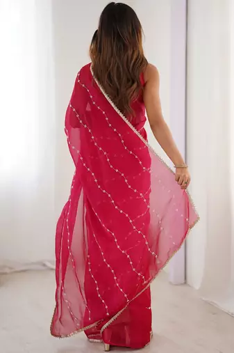 Pink embellished beads and stones saree
