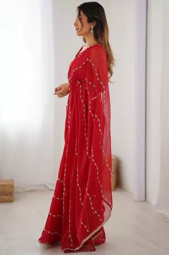 Red embellished beads and stones saree