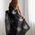 Black floral embellished sequinned saree with blouse