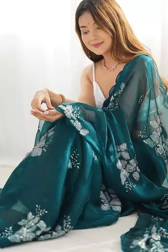 Teal floral embroidered sequinned pure chiffon saree