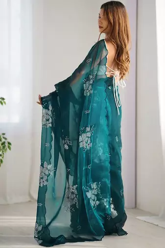 Teal floral embroidered sequinned pure chiffon saree