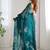 Teal floral embroidered sequinned pure chiffon saree