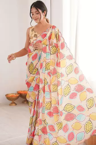 Cream floral mirror work pure chiffon ikat saree