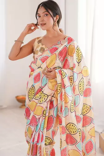 Cream floral mirror work pure chiffon ikat saree