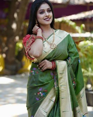 Green woven design zari paithani saree 1