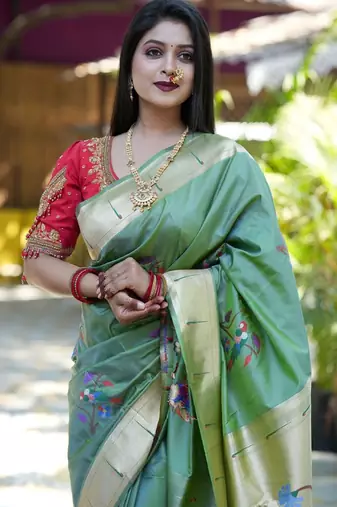 Green woven design zari paithani saree