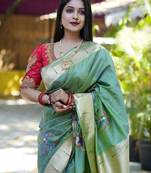 Green woven design zari paithani saree