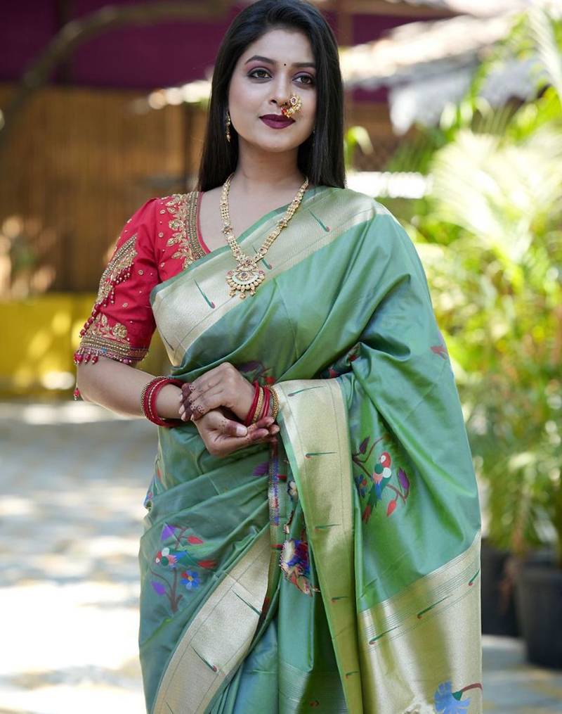 Green woven design zari paithani saree