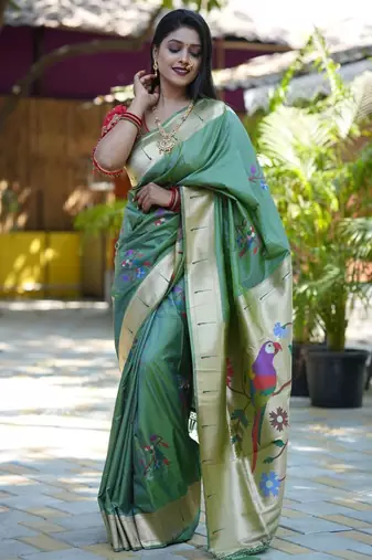 Green woven design zari paithani saree