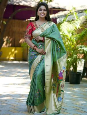Green woven design zari paithani saree 4